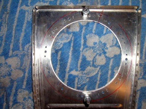 Tank inspection hole cut and doubler back drilled to rib