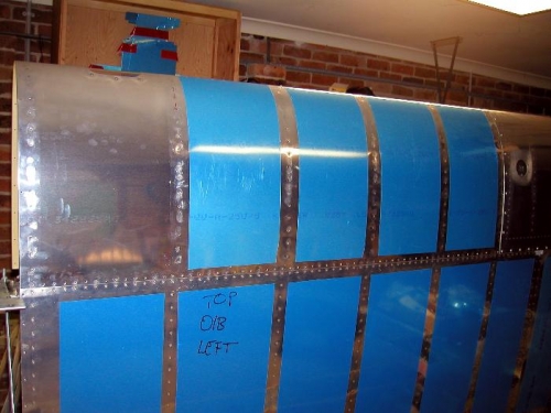 Leading edge riveted to spar