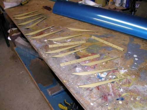 Stiffeners in etch primer after being edge finished and dimpled