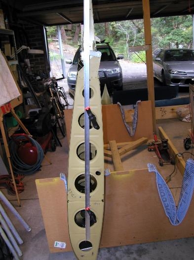 Left wing in cradle and aileron jig installed to hold it in the correct position.