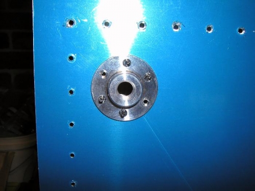 Fuel drain back drilled to tank skin