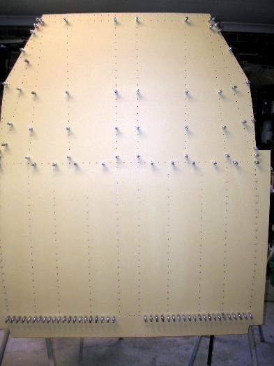 Front half of the floor skins riveted in place