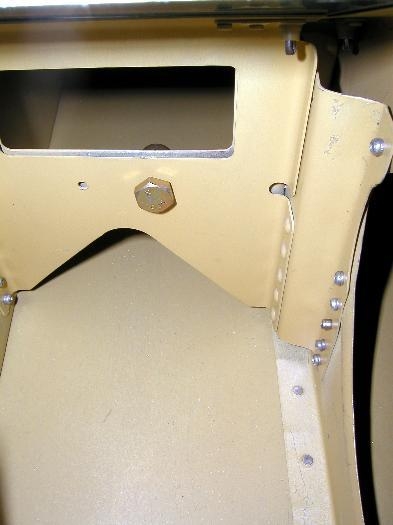 Extension bracket I made to allow the installation of the crotch strap bracket