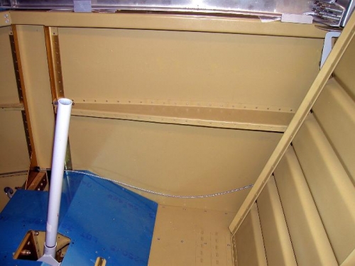 Riveted bot arm rests into place