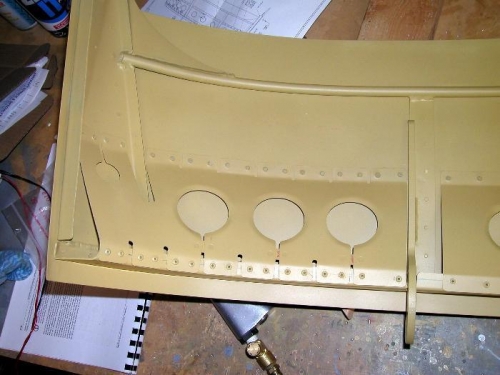 Left veiw of canopy brace riveted into place