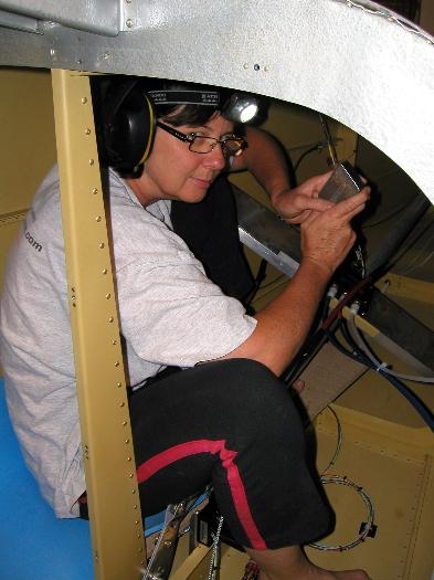 Anne-Marie in the rear luggage, fuselage area bucking rivets