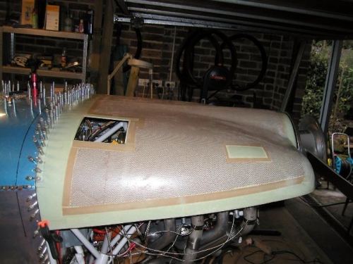 Hinge back drilled to top cowl