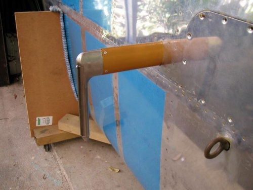 Hole in skin cut, pitot and mast installed adn riveted