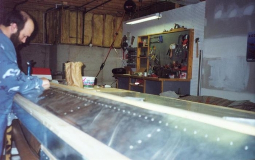 Inspecting final work on ailerons