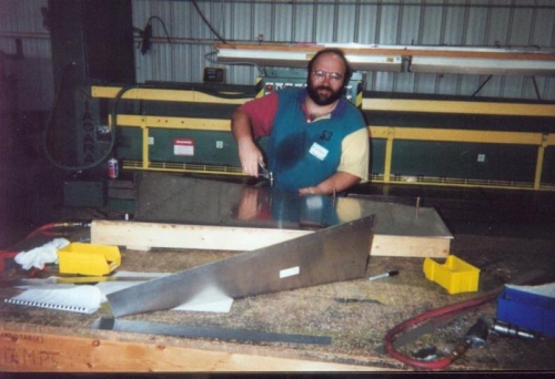 Putting in those final rivets.