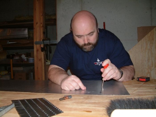 Using Punch to Mark Rivet Holes for Drilling