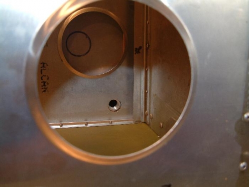 Tank back in with fuel outlet all aligned with hole.