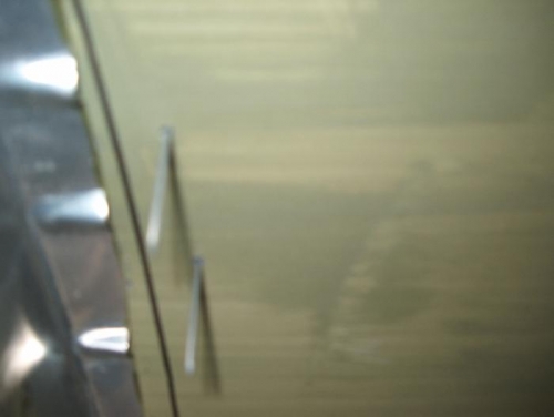 With rivets in place to check reference