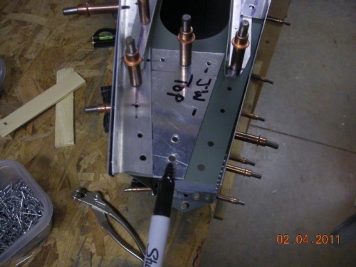 Upper rudder hinge mounts here