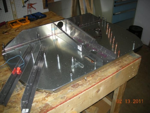 Gear channel in place. Front side stiffners laying to the left, already cut & drilled.