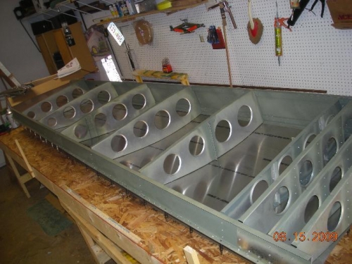 Bottom of right wing naked.