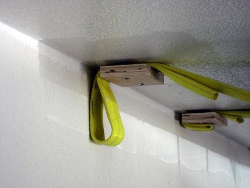 Old attachment, next to ceiling wastes space.