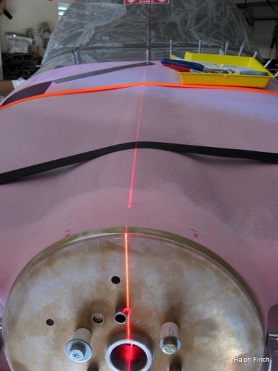 Align laser level straight down prop and canopy to aid in marking equal distance each side