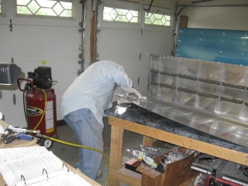 Positioning the fuel cap fitting in the proper direction.