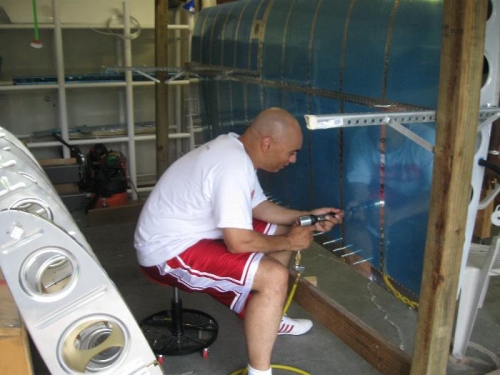 Tim Moore as the Riveter.