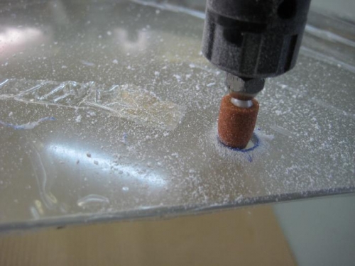 Cut holes to 3/8 with a grinding wheel