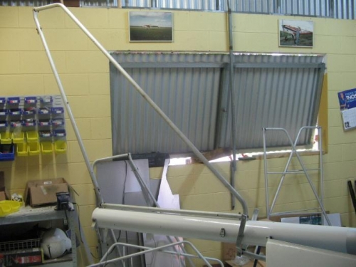 vertical fin refitted to boom tube