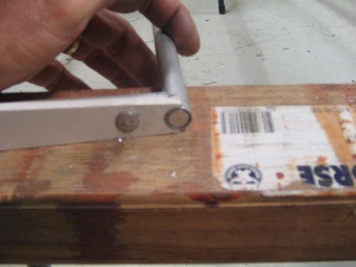 rod inserted in trailing edge tube.