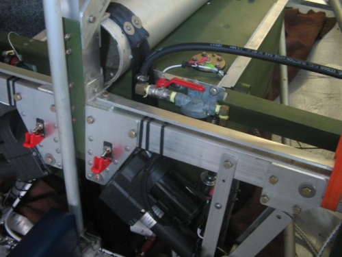 hose connected to top outlet feed to engine