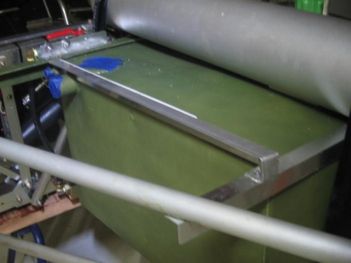 trim support angle and fuel tank positioning angle