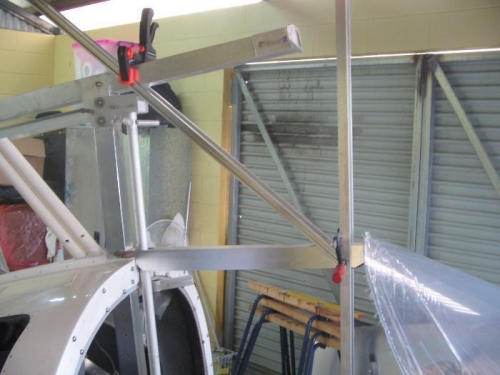 horizontal support held in place with various angles and clamps