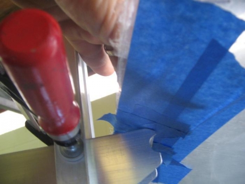 angle cut on forward edge of horizontal support to suit windscreen angle