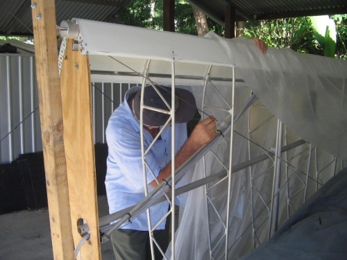 Paul Williams inspecting wings before commencing covering
