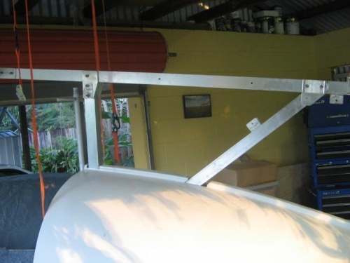 forward & mid root supports through turtle deck cutouts