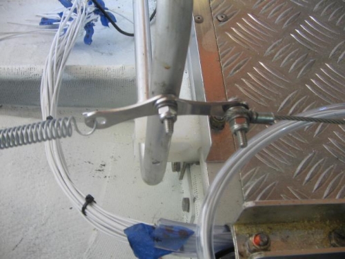 tang attached to rudder cable.