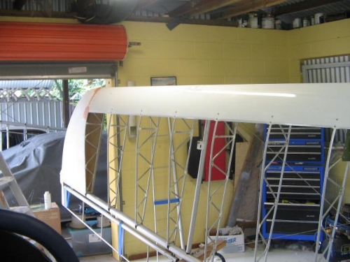 wing cuff riveted in position