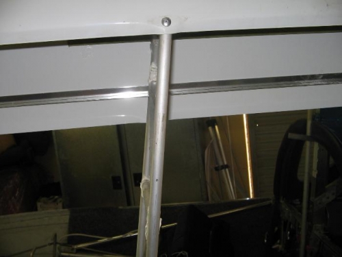 1/8th hole in bottom rib