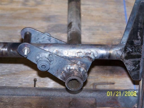 Welded and check fit with retract arms