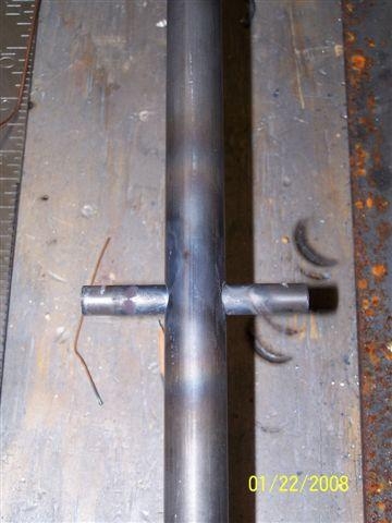 Spring attach tube.  Nice and normal to main tube