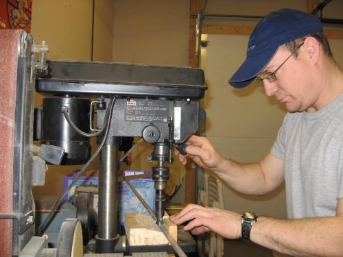 I made a wooden jig to hold it on the right angle