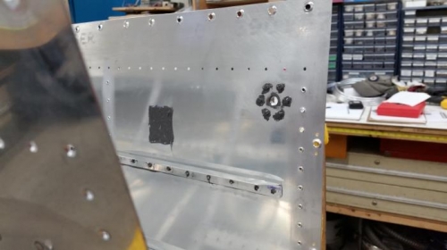 Black patch is sealant to cushion float of sender