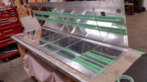 Black patch of sealant next to drain is to protect the fuel tank from the fuel guage float.