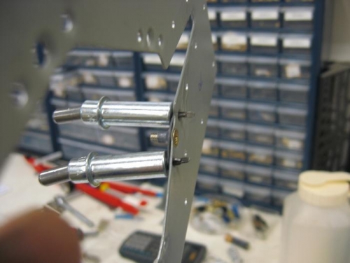 Used a screw to keep the nutplate in place while rivetting