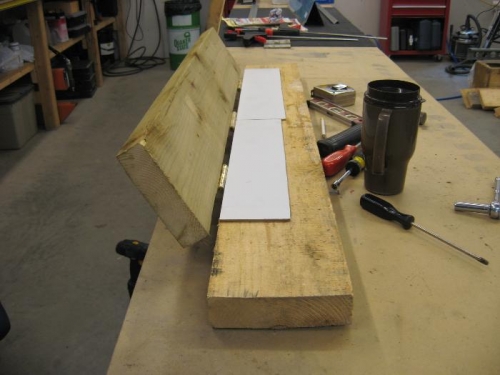 Used cardboard to tighten the bend on the trim tabs