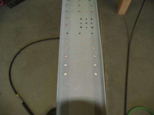 Spar being riveted to doublers