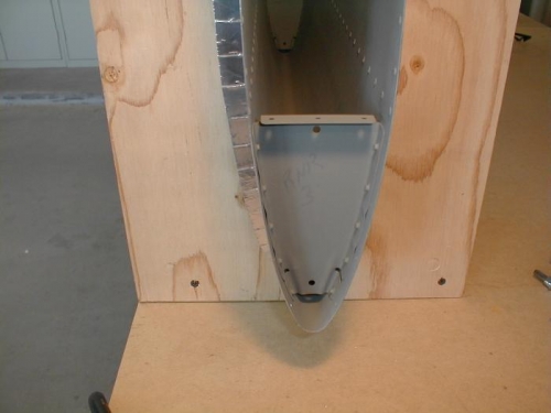 Nose rib riveted in place