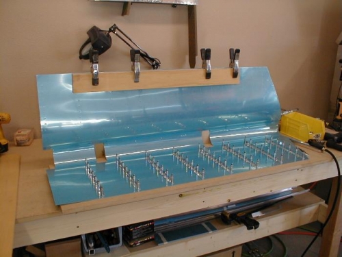 Fitting the stiffeners to the skin