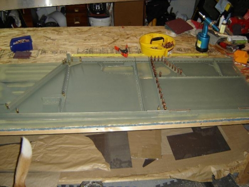 Upper and lower mounts awaiting bolts.  Everything else riveted in place except the aft wing attach.