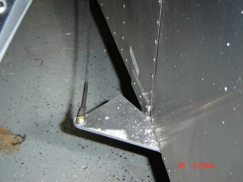 Rudder cables attached to the rudder horn.