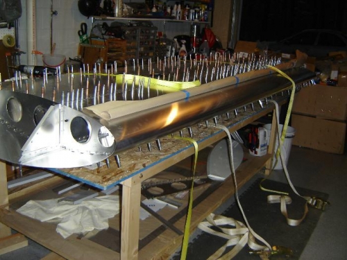 Bottom side pulled into place and clecoed on to the bottom of the main spar.