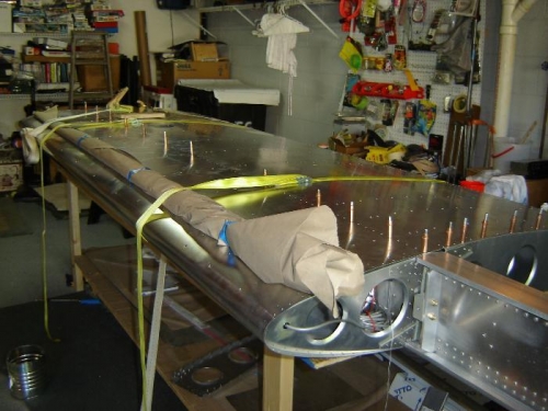 Pulling the LE down to match holes.